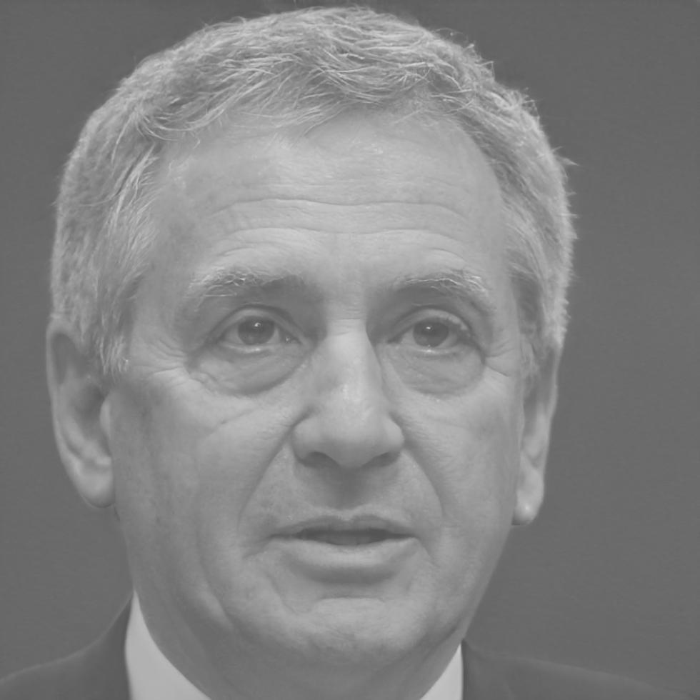 Professional headshot of Eduardo Martinez