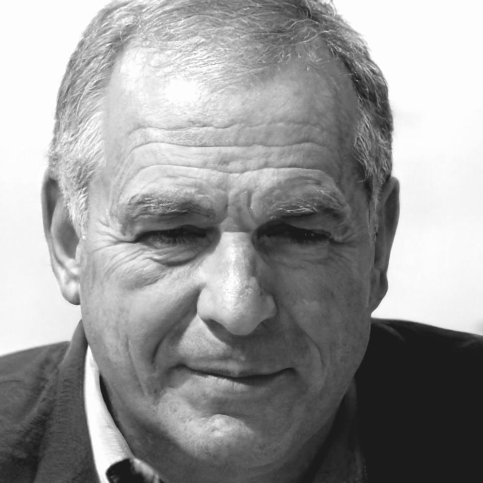 Professional headshot of Cornelius Ravencroft, Budget Strategy Specialist